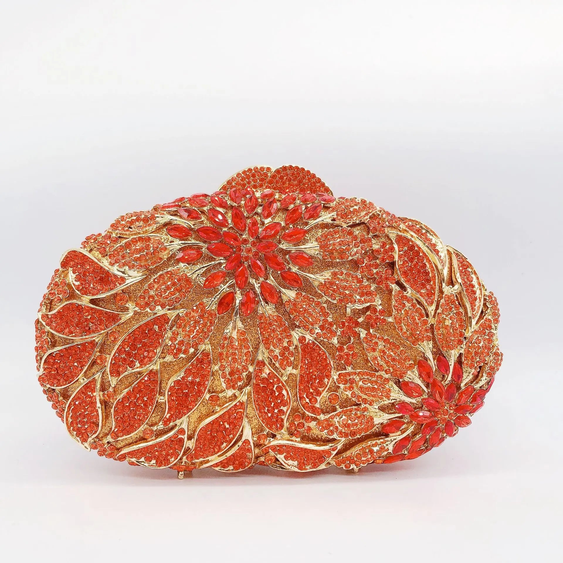 Gold metal leaves and white crystal evening clutch bag by MC THE BLACK DIAMOND, luxury mini heart-shaped purse for women’s weddings and parties.