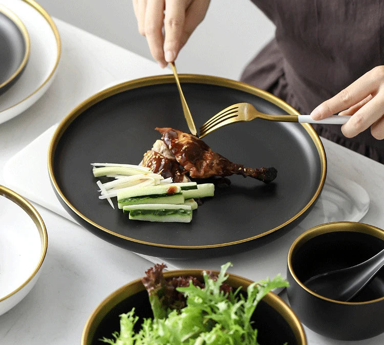 Black and white matte porcelain dinner plate from MC THE BLACK DIAMOND, kitchenware with a sleek, modern design.