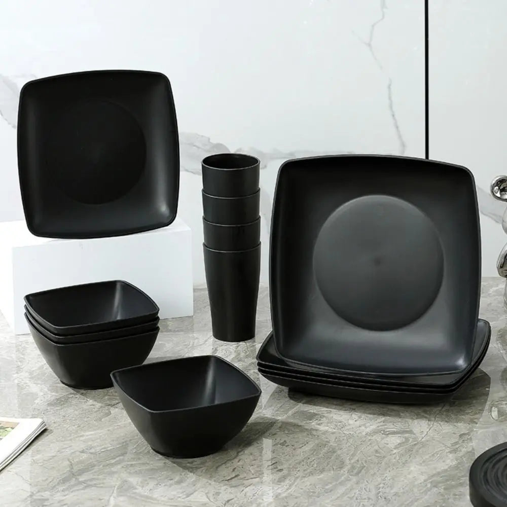 16-piece plastic square dinnerware set by MC The Black Diamonds, including plates and bowls for kitchen use