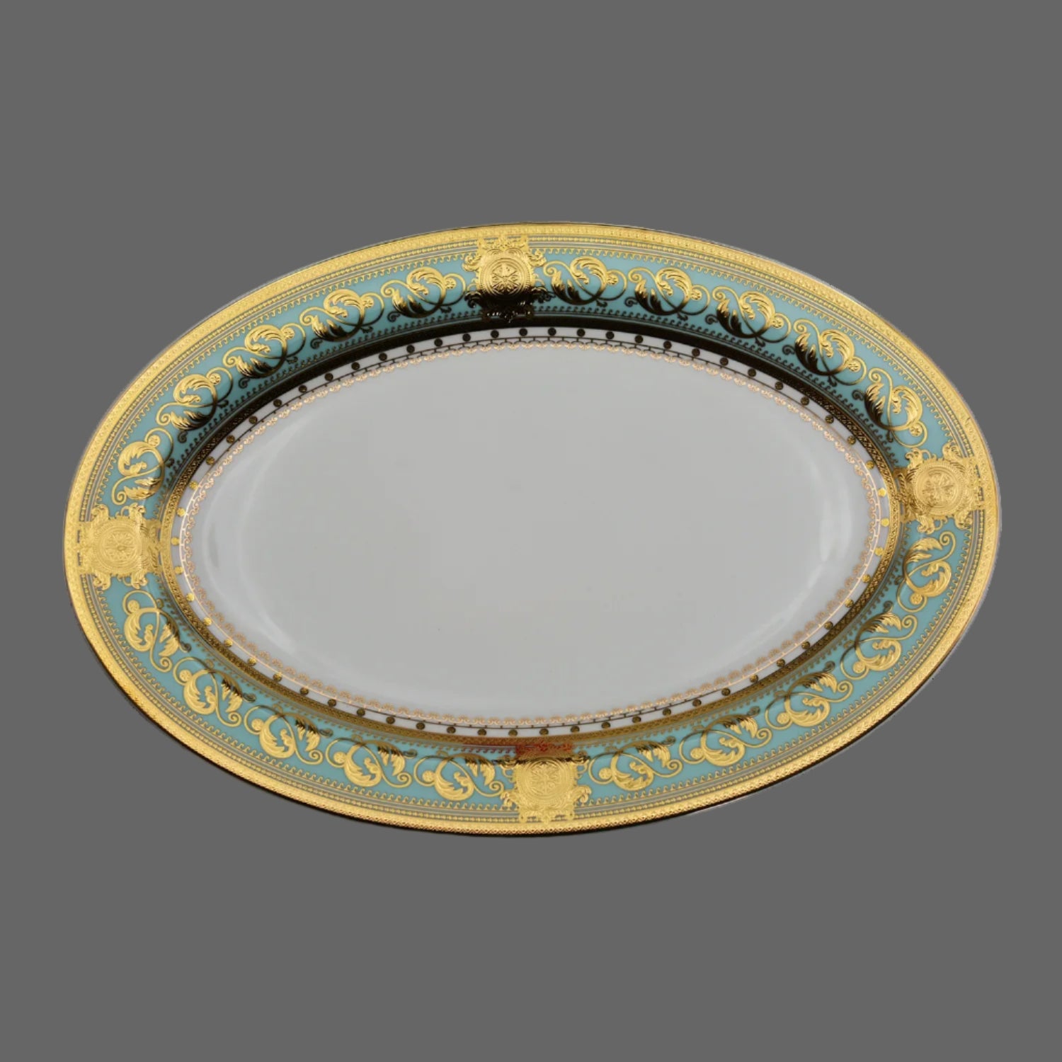Elegant gold embossed porcelain dinnerware set by MC THE BLACK DIAMOND, featuring luxury bone china with intricate embossed designs.