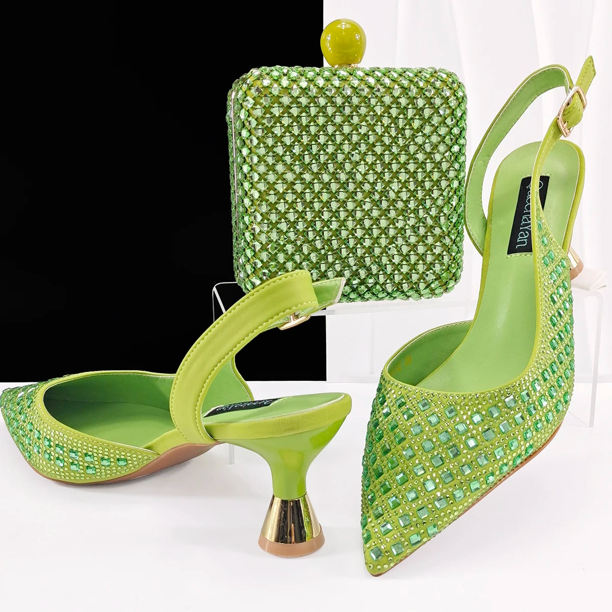 Elegant MC THE BLACK DIAMOND heels and matching bag set for women, perfect for parties and weddings, with silver accents.