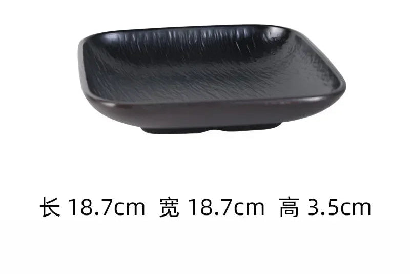 Black frosted melamine dinner plate from 𝕄𝕔 𝕋𝕙𝕖 𝔹𝕝𝕒𝕔𝕜 𝔻𝕚𝕒𝕞𝕠𝕟