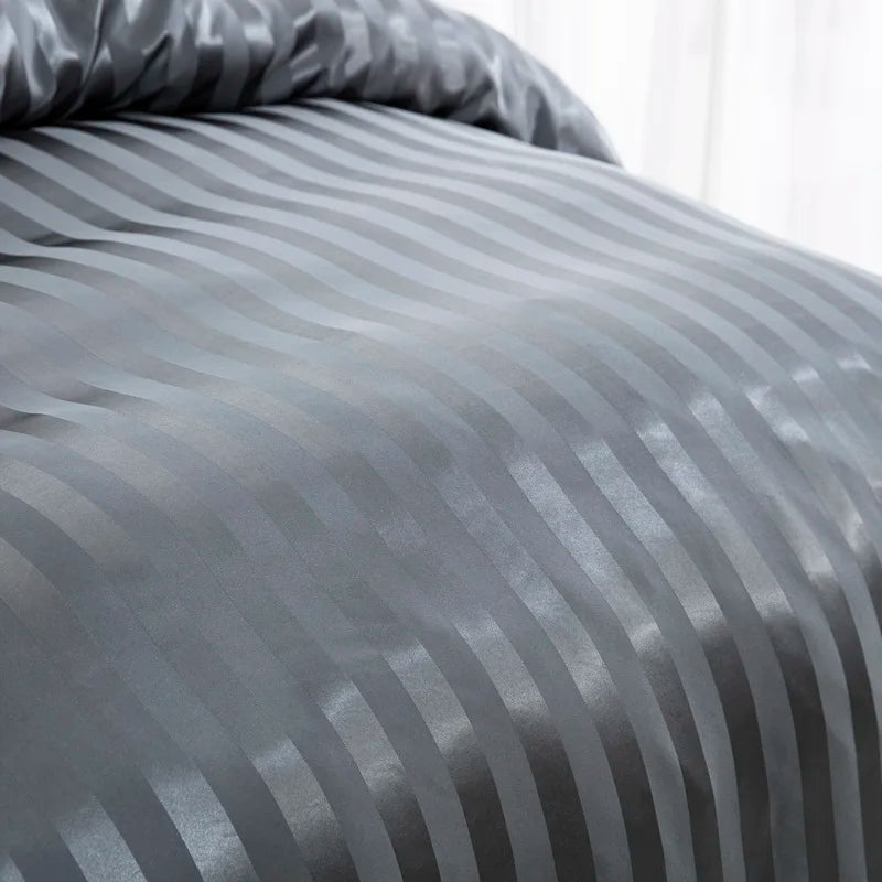 Luxury satin striped duvet cover set in ivory white, featuring silky soft fabric, available in full, queen, king, single, and double sizes.