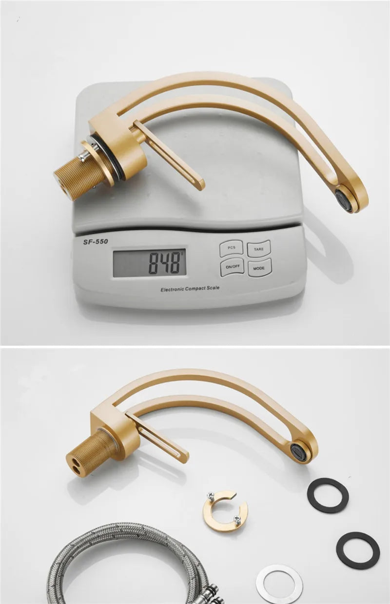 Black, grey, white, and gold bathroom mixer tap for wash basin by MC THE BLACK DIAMOND, with sleek modern design.