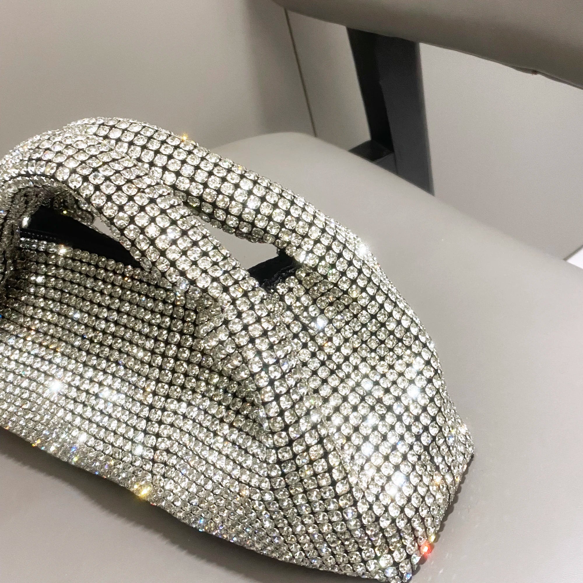 Shiny crystal clutch purse by MC THE BLACK DIAMOND, handmade rhinestone evening handbag with bucket shoulder style.