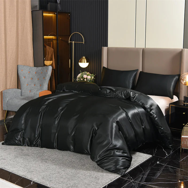 Three-piece satin duvet cover set from 𝕄𝕔 𝕃𝕒𝕔𝕜 𝔻𝕚𝕒𝕞𝕠𝕟𝕕𝕤, featuring smooth, shiny fabric and elegant