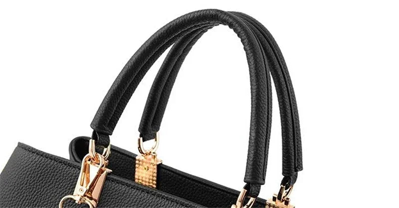 Women messenger bag with flower pendant from MC The Black Diamonds, stylish crossbody tote for office and casual wear.