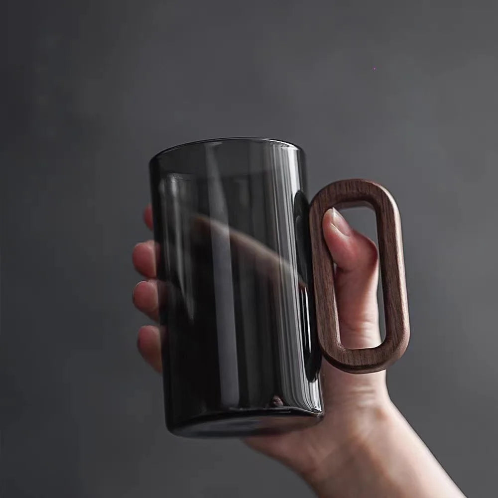 Glass mug with wooden handle from 𝕄𝕔 𝕋𝕙𝕖 𝔹𝕝𝕒𝕔𝕜 𝔻𝕚𝕒𝕞𝕠𝕟�