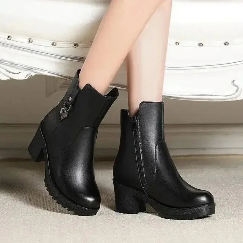 Luxury women's winter leather boots with high heels, casual fashion style, from Mohammad Collection, showcasing sleek design and stitching details.