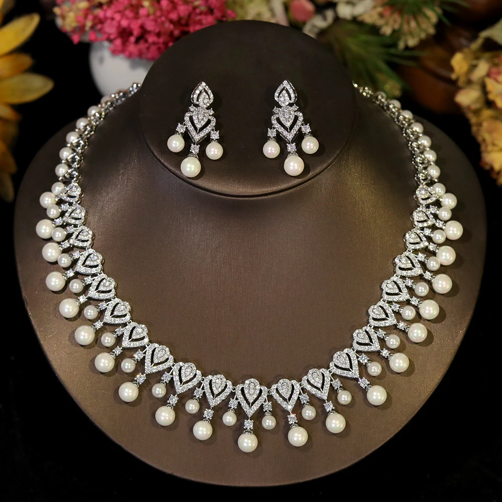 Elegant pearl necklace for women featuring a string of lustrous white pearls, perfect for sophisticated jewelry styling.