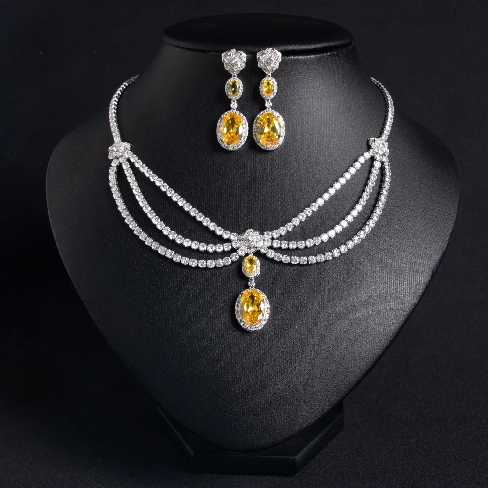 Elegant women's jewelry set with green zircon flower tassel necklace and matching earrings, featuring intricate design.