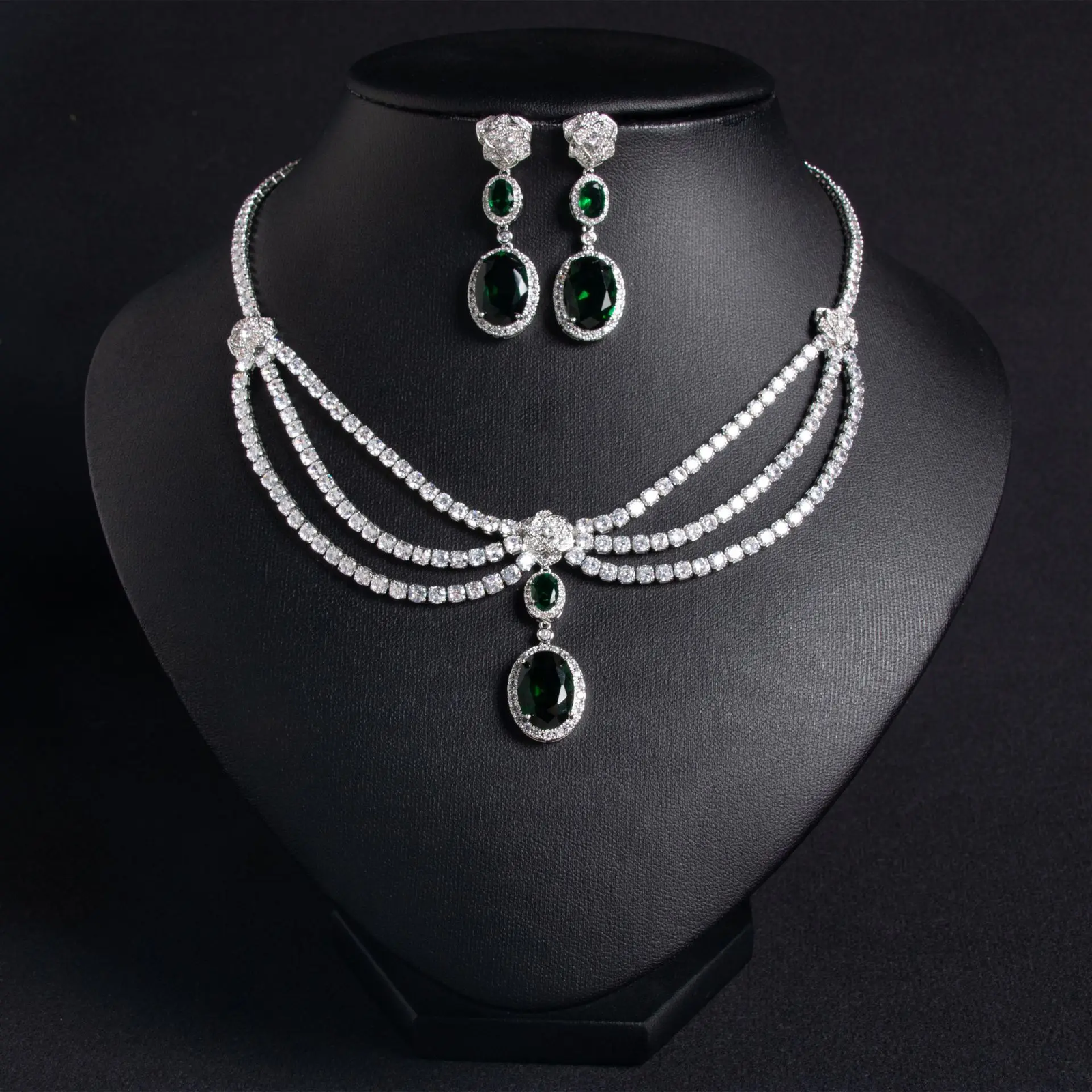 Elegant women's jewelry set with green zircon flower tassel necklace and matching earrings, featuring intricate floral design.