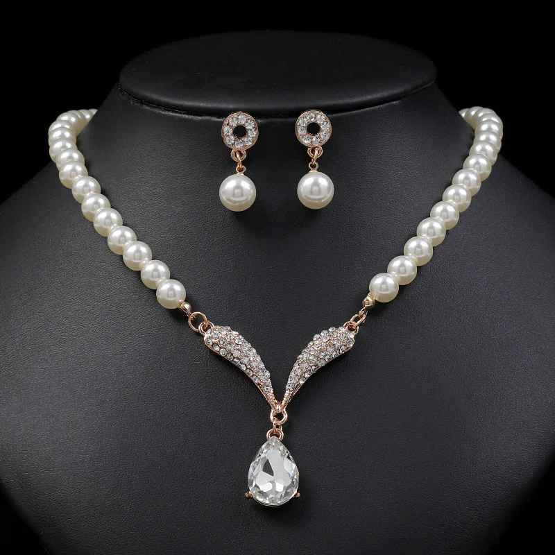 Mohammad Collection women's 3-piece pearl jewelry set with necklace and earrings, elegant gold-tone design for versatile styling.