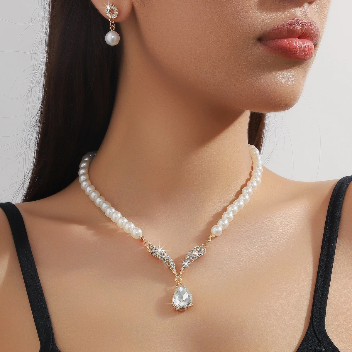 Mohammad Collection 3-piece pearl droplet necklace and earrings set in gold, perfect for weddings and special events.