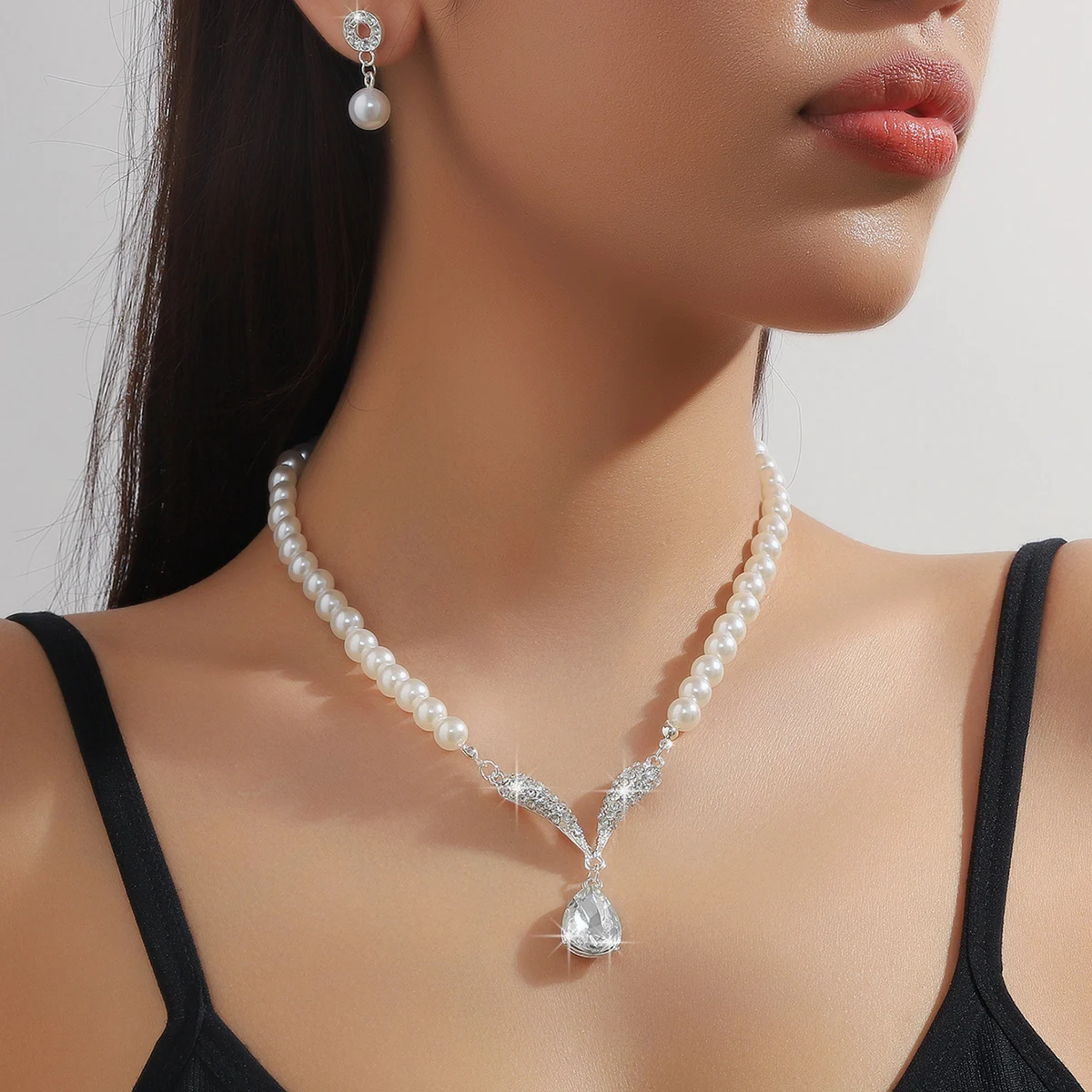 Mohammad Collection 3-piece pearl droplet necklace and earrings jewelry set with gold finish, perfect for weddings and special occasions.